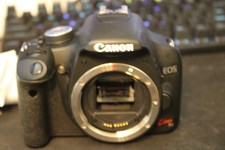 Canon EOS Kiss X3 / Rebel T1i / 500D 15.1 MP DSLR Camera Body - Battery- Charger