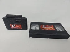 GameShark Pro N64 Video game System and VHS How To Hack Like A Pro