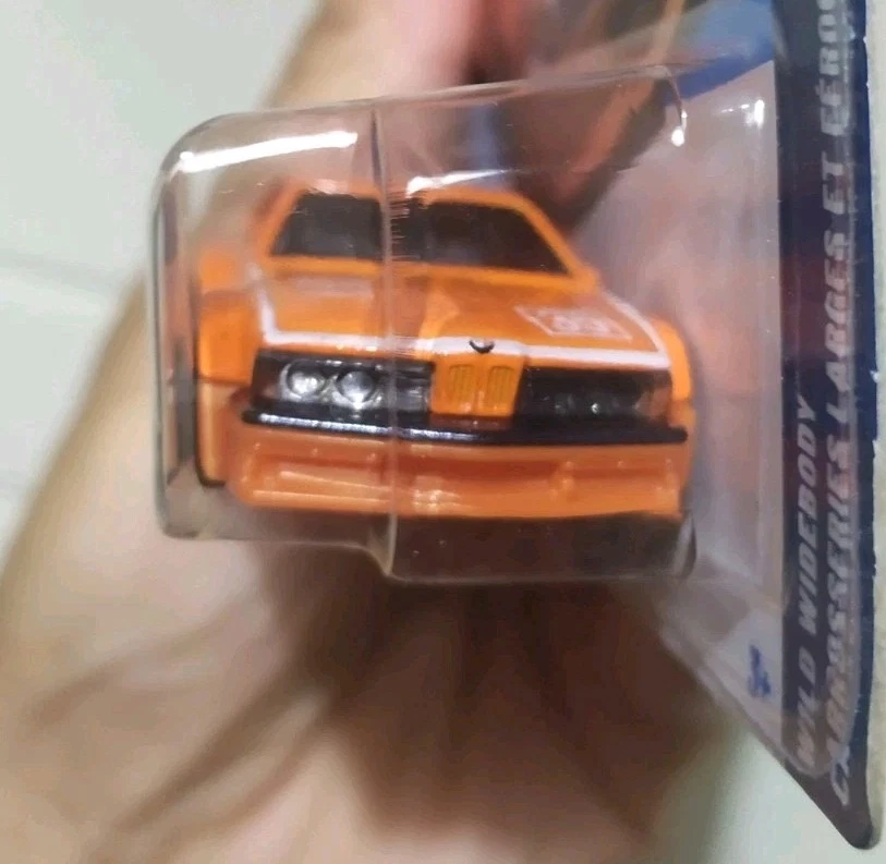 Hot Wheels BMW 635 Csi Arancione Case P 2025 1:64 - Immagine 3 di 4