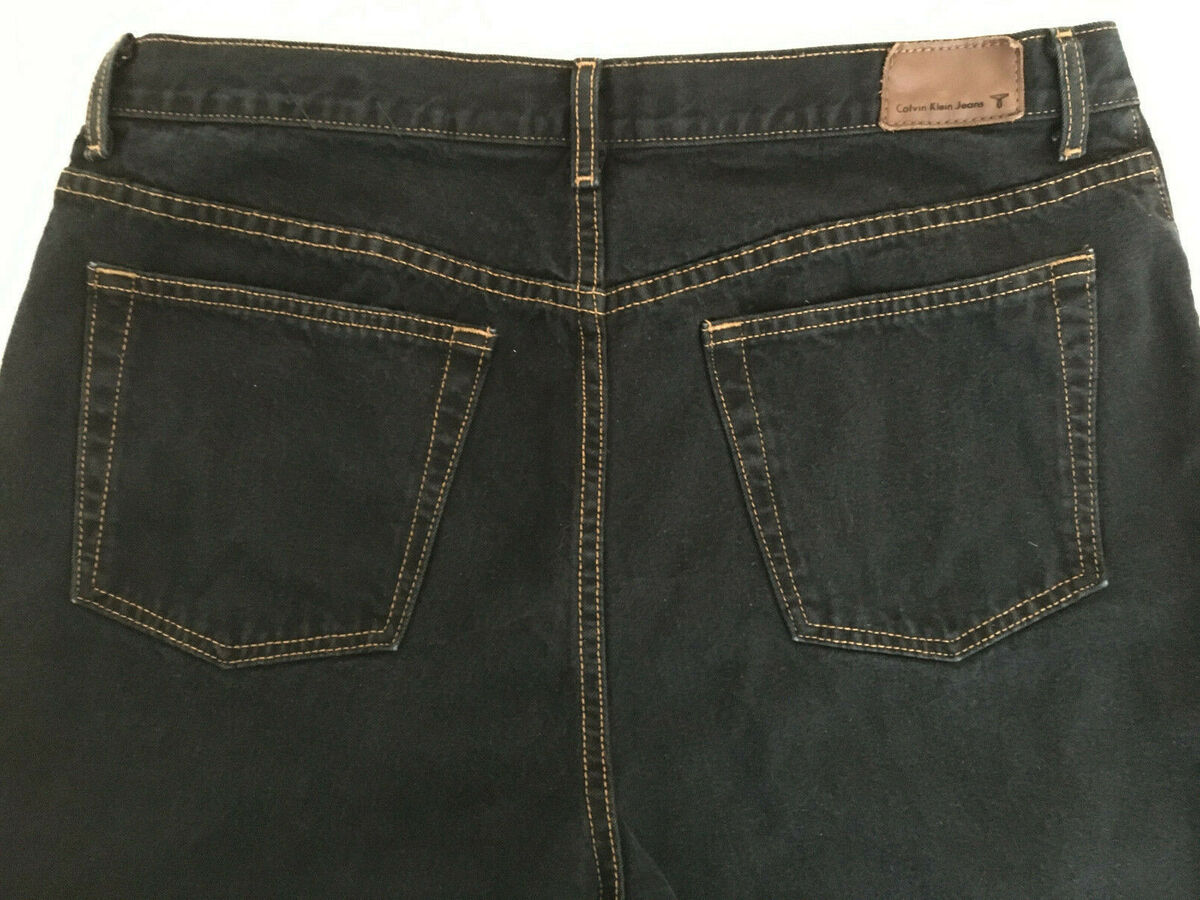 Calvin Klein high rise boot cut black overdye jeans 16 Calvin Klein high rise boot cut black overdye jeans 16