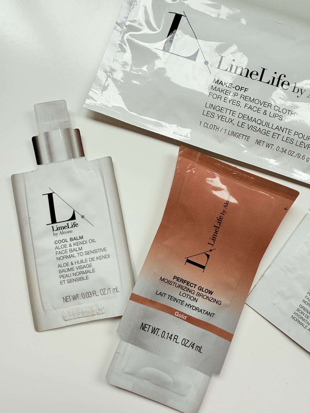 LimeLife by Alcone Travel Set Makeup Remover Cloth Moisturizer Puff Bag