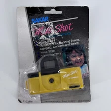 VINTAGE Sakar 110 Film Micro Mini Shot Travel Handheld Camera YELLOW - NEW NOS