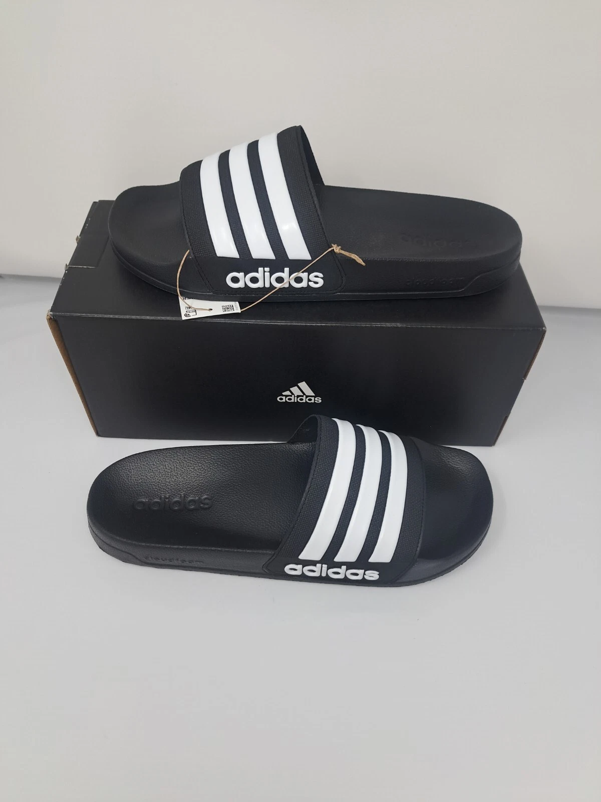 .SANDALI ADIDAS ADILETTE DOCCIA SLIDES UOMO US TAGLIA 11 UOMO NERO BIANCO GZ5922