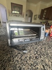 "Horno tostador de convección black and decker 12"" capacidad pizza funcionando bien estado"