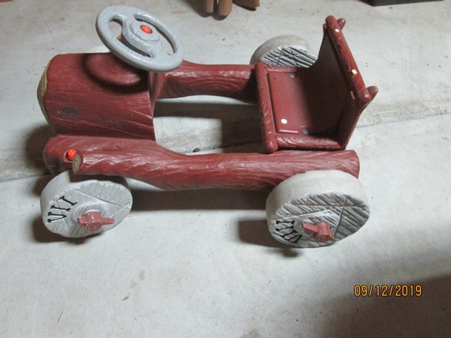flintstone pedal car
