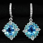 925 Sterling Silver White Gold Earrings Vibrant Swiss Blue Topaz Oval 6.02Ct