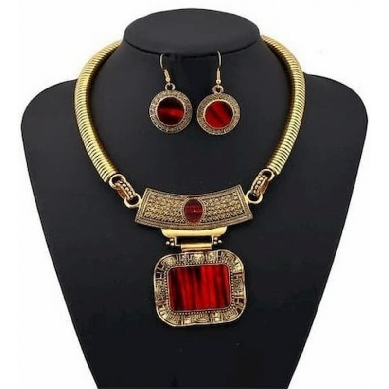Conjunto dorado de collar y pendientes con piedras rojas y blancas