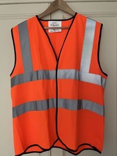 POMARAŃCZOWA KAMIZELKA OCHRONNA ODBLASKOWA KAMIZELKA HACZYK I ZAPIĘCIE NA PĘTLĘ ROZMIAR L OCHRONA BUDYNKU