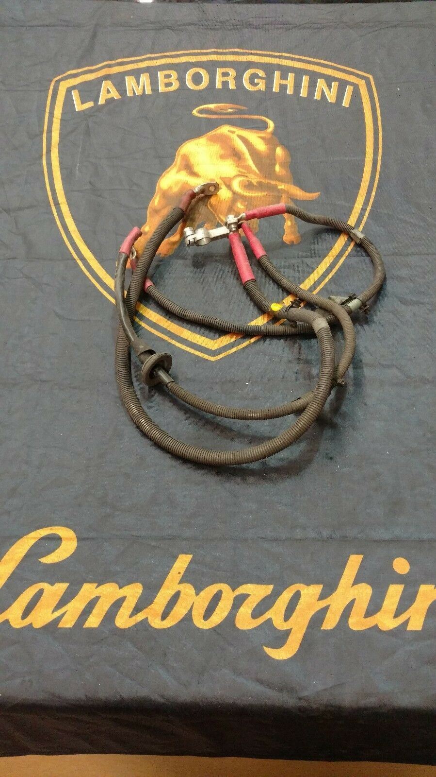 LAMBORGHINI MURCIELAGO LP640 POSITIVE BATTERY CABLE STRAP OEM