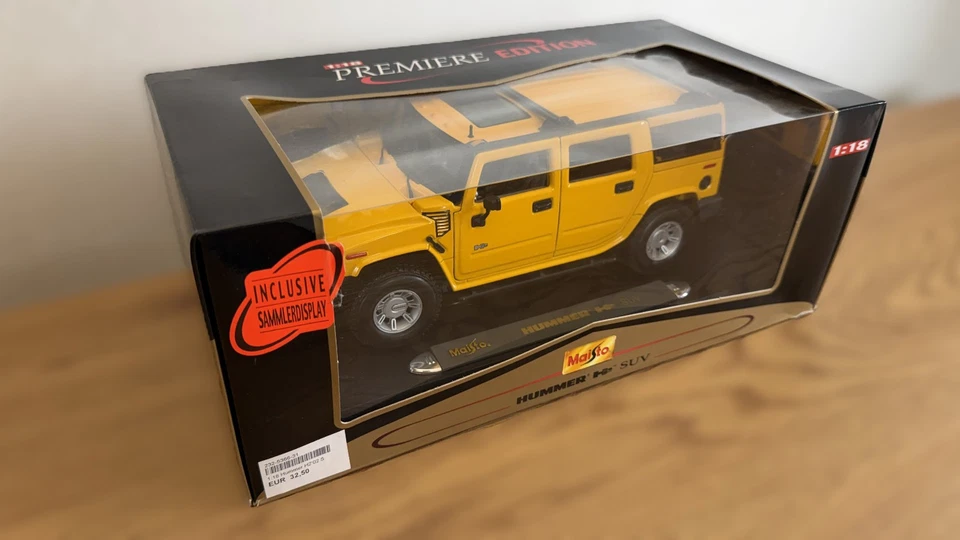 Maisto Premiere Edition Hummer H2 SUV 1:18 giallo confezione originale - Immagine 3 di 4