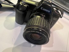 Appareil photo Canon EOS 1000 et Objectif Canon 35-80mm ( avec pilles neuves)