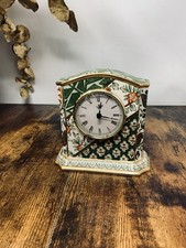 Vintage Masons  Applique pattern quartz mantel clock.
