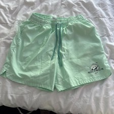 nike sportswear men's woven flow medium shorts mint green DV9600-379 Sun Club