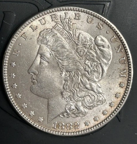 1882 Morgan Silver Dollar Slight Toning Luster UNC.
