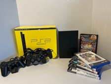 Sony PlayStation 2 Slim Black With 6 Games Two Controllers All Fully Tested.