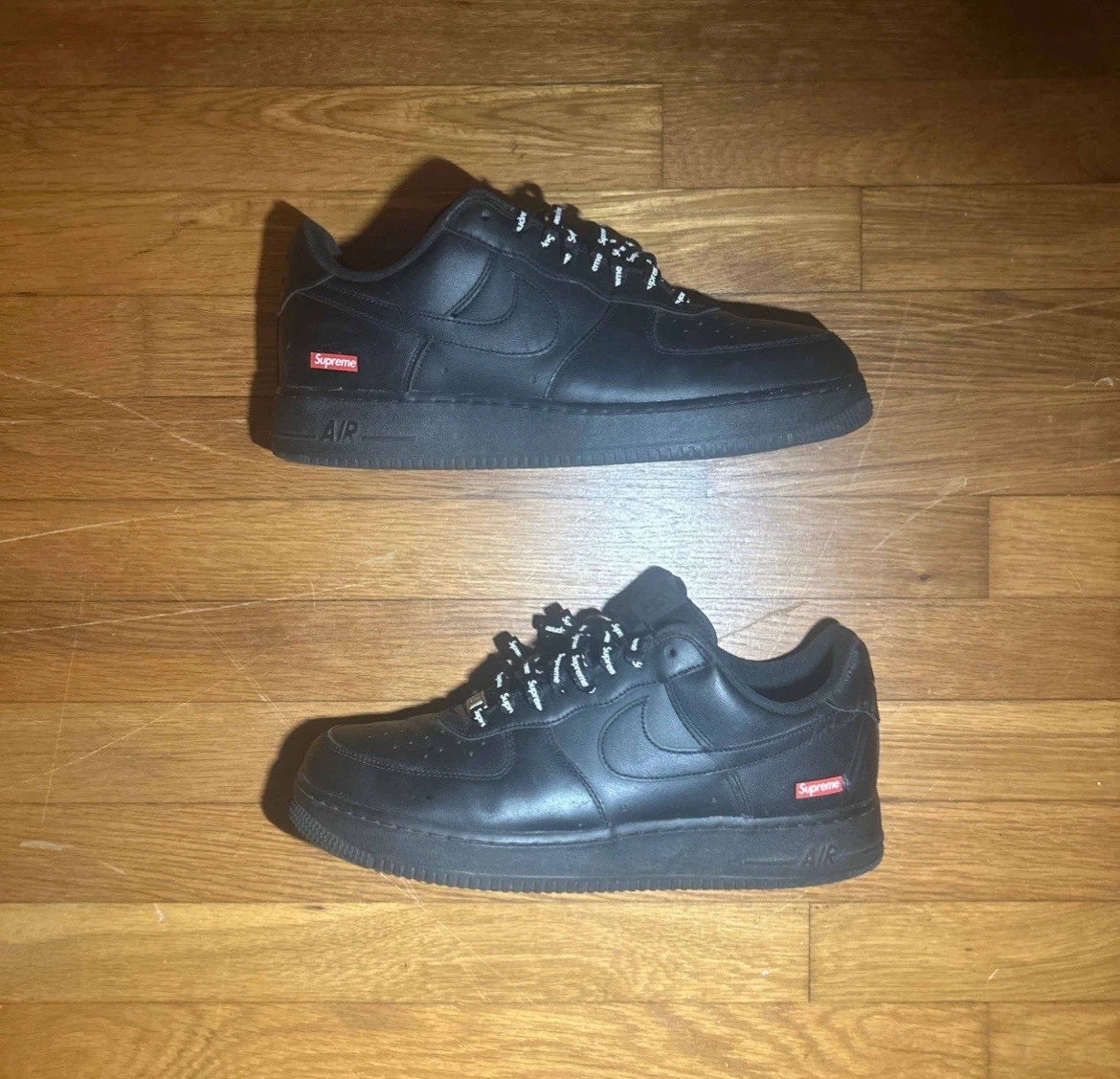 Baskets noires Nike Air Force 1 Supreme taille US 11 