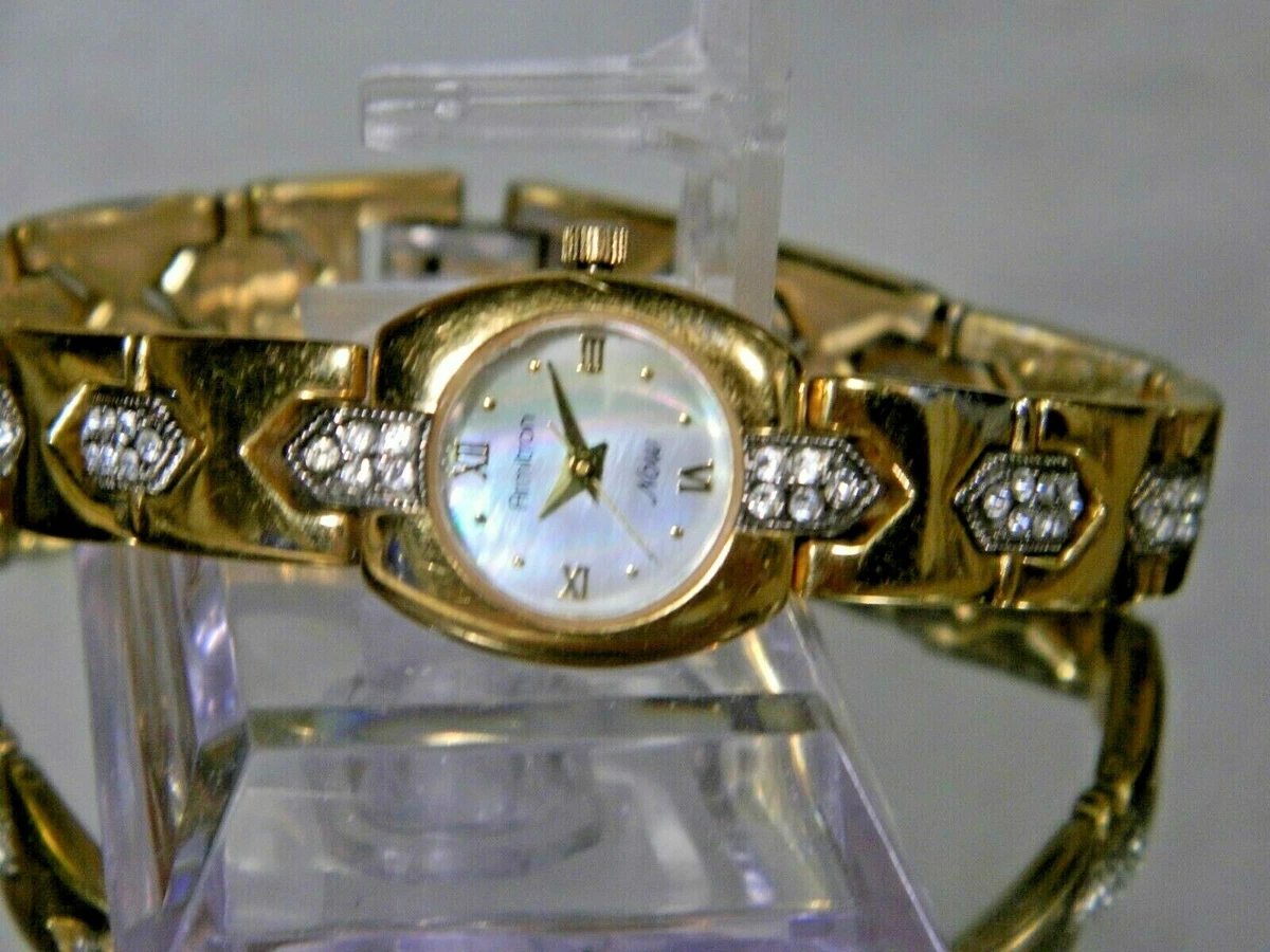 Women s Gemmed Armitron Now Mother of Pearl Watch. New Battery. 2