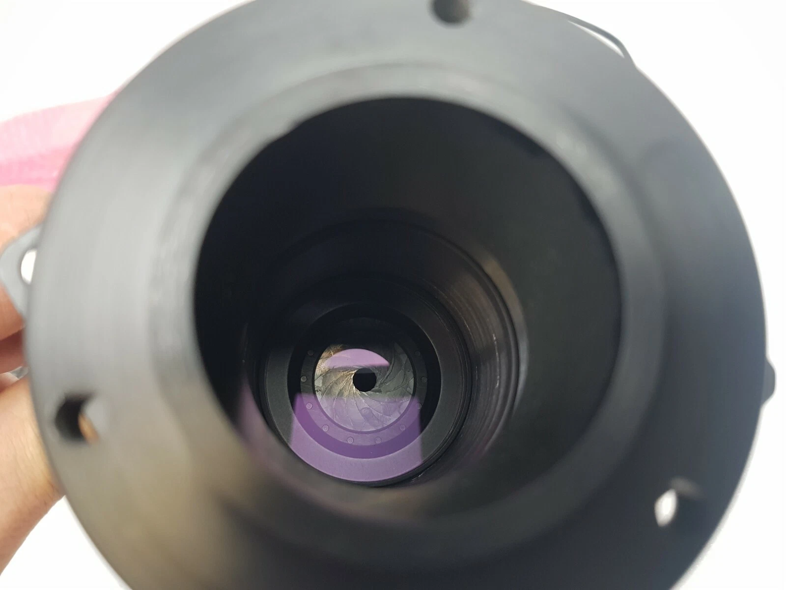View into the front flange of the camera optics showing the iris diaphragm