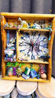 This one-of-a-kind handmade wall clock is a miniature world inspired by fantasy