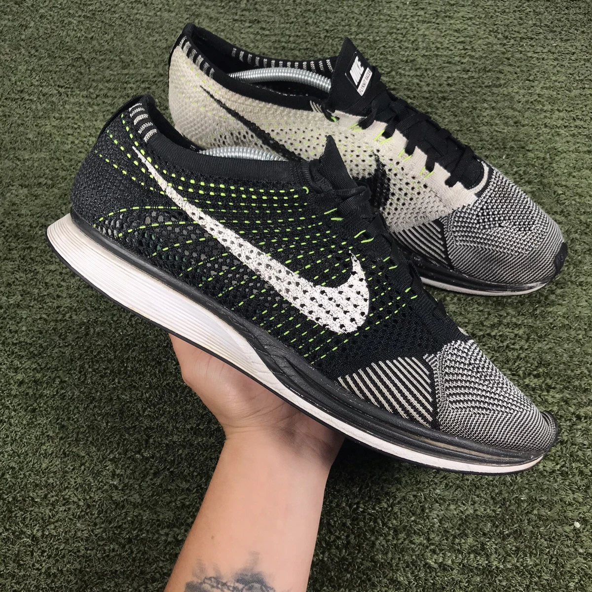 Flyknit racer clearance black white volt