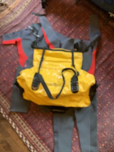 A Pair Of Westsuits Small-medium And Wet Bag