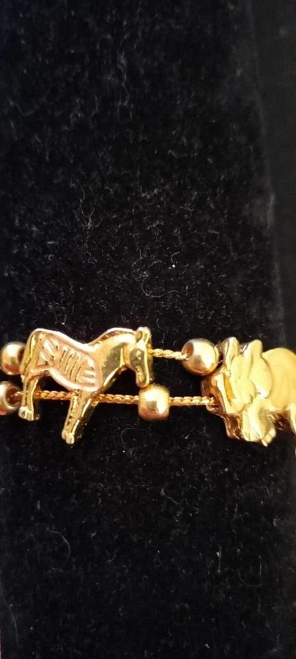 Impresionante y Adorable Pulsera Dije Animal Tono Dorado AVON con Piedra Dorada Rosa/Melocotón Foto 2 de 4