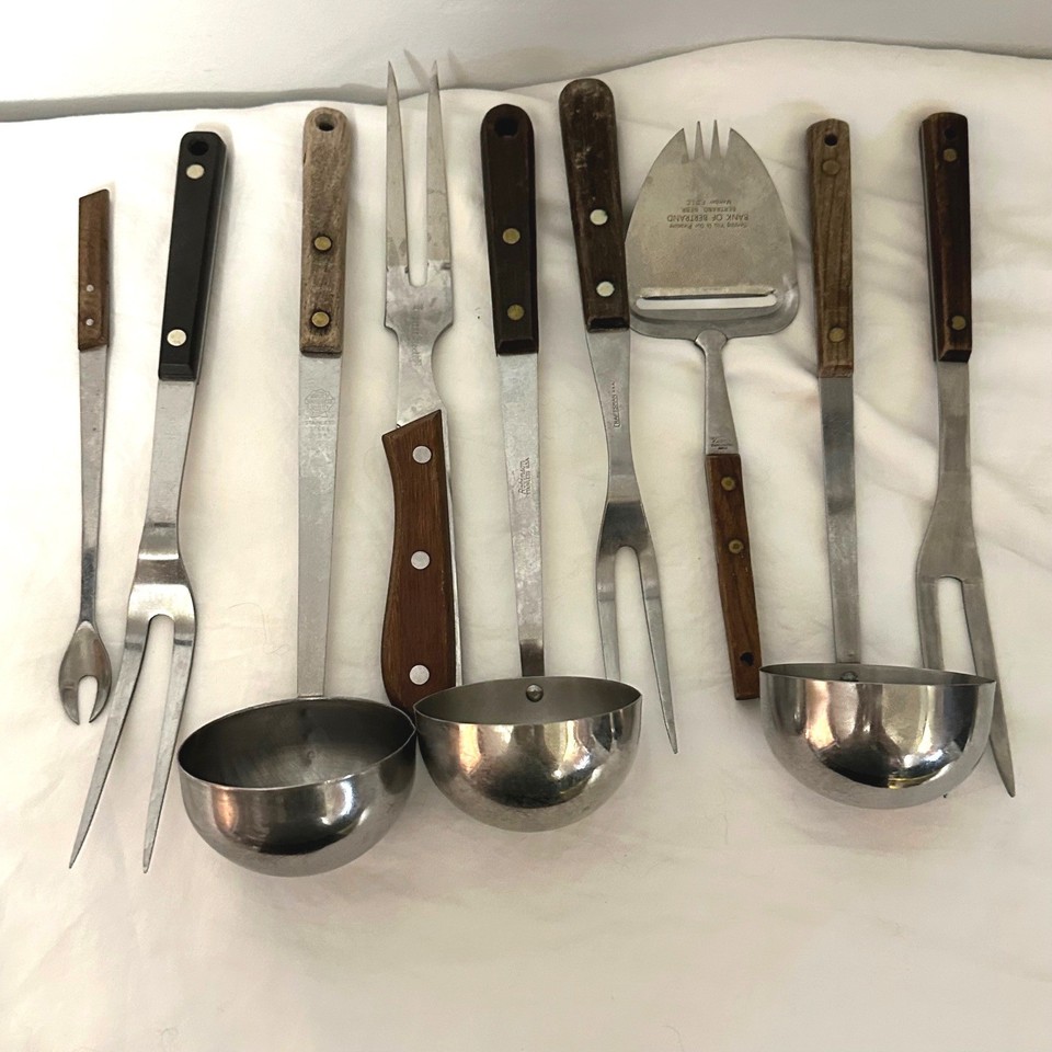A cohesive Ekco Flint set with those gorgeous Good Wood handles and stainless steel — the gold standard of mid-century American kitchen design.