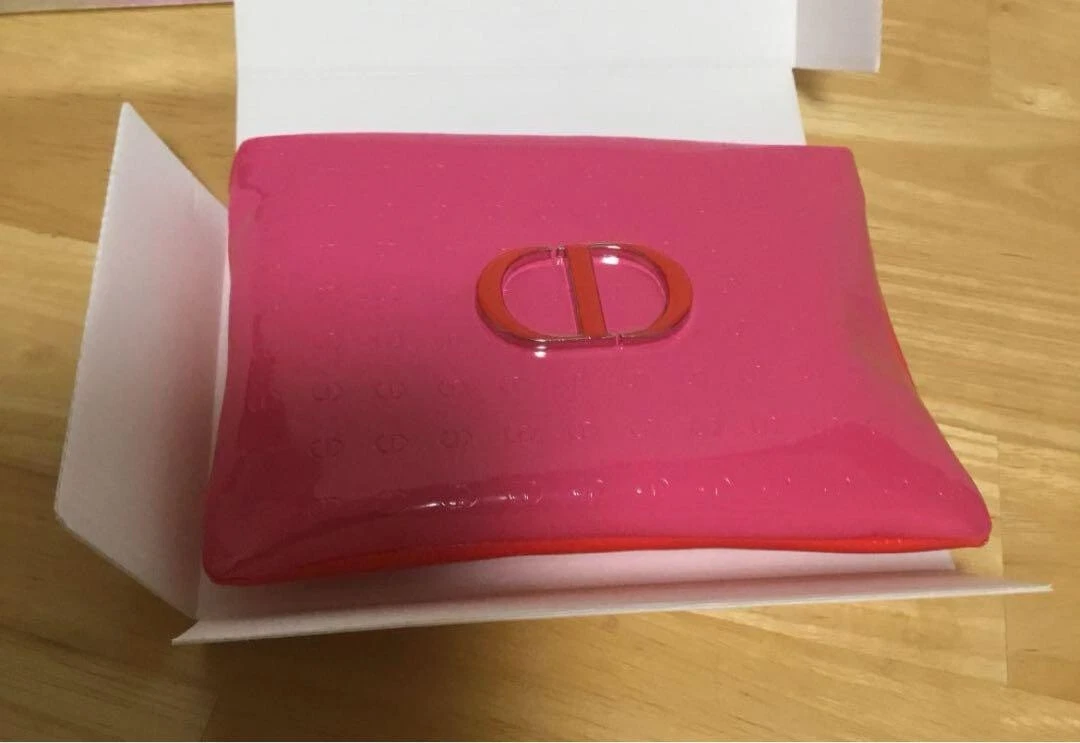 Pochette Christian Dior rose matière cuir synthétique livrée avec boite d'origine