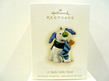 HALLMARK KEEPSAKE ORNAMENTS  A TASTY LITTLE TREAT - PUPPY WITH BONE IN CHRISTMAS