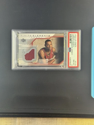 PSA 8 LEBRON JAMES 2003-04 UPPER DECK FINITE ELEMENTS JERSEY RC ROOKIE (LAKERS)