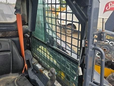 John Deere 318G Left/Driver Equip Side Glass - Used | P/N AT488972