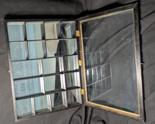 Glass display cabinet with mirrored back and wooden figurine stand, 12.5 x 16.5