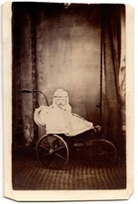 ANTIQUE CDV CIRCA 1860s CUTE YOUNG GIRL SITTING IN BABY STROLLER CIVIL WAR ERA