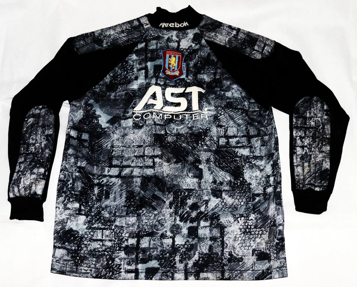 Preços baixos em Reebok ASTON Villa International Club Camisas de