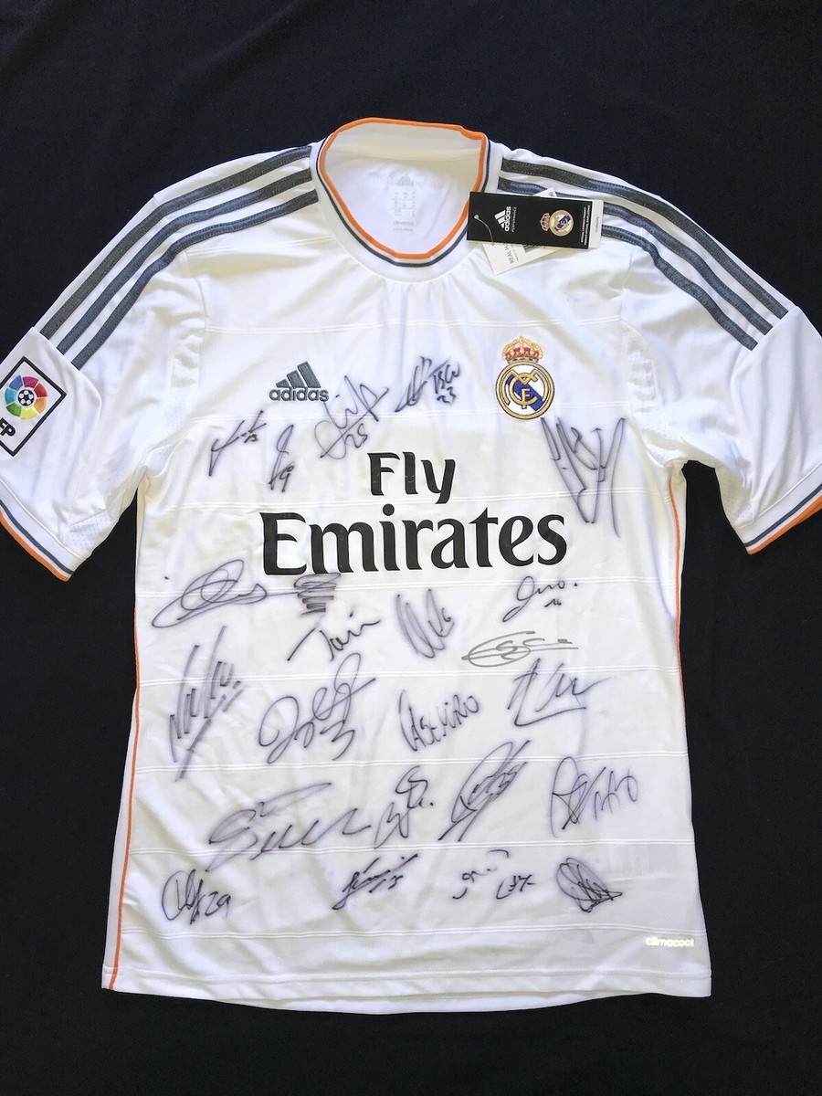 Real Madrid signed jersey 2012-2013 winners at Adidas event Real Madrid signed jersey 2012-2013 winners at Adidas event