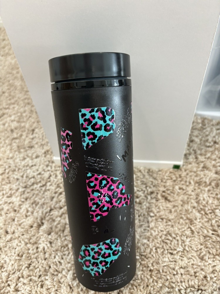 Insulated tumbler with leak-proof lid and reusable straw