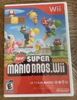 New Super Mario Bros. Wii (Nintendo Wii, 2009) - NOT WORKING