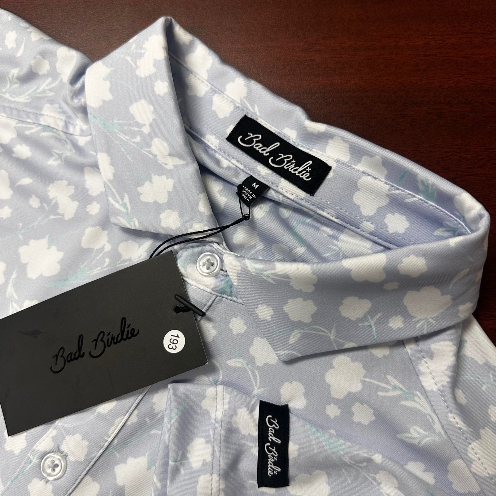 Bad Birdie Polo Shirt Mens Medium Baby Lush Floral Golf Core Blue Summer NWT