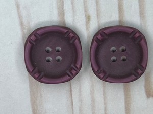 Dk purple/ mulberry color- decorative raised edging-2 hole buttons-13/16”