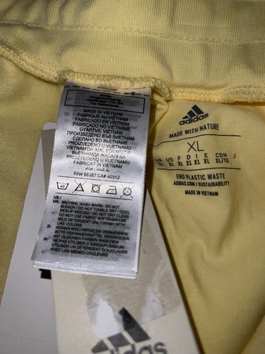 Pantalones cortos deportivos Adidas para hombre amarillos internos de vellón talla XL NUEVOS CON ETIQUETAS $45 - Imagen 7 de 7