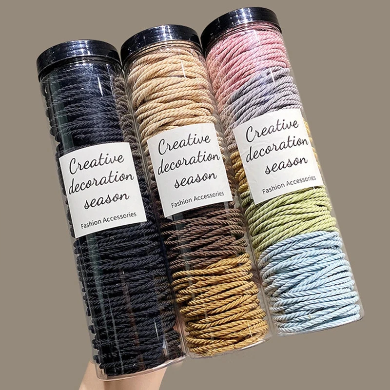 Bandas elásticas para el cabello de goma maciza de 100 piezas Foto 2 de 4