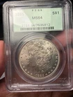 1885 Morgan silver dollar -- strong luster!