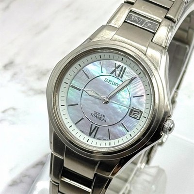 Seiko V182-0AA0 Solar Titanium Ladies Watch Shell Dial