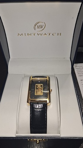 Men's 1 gram Gold PAMP Suisse Grain Leather Band Watch.