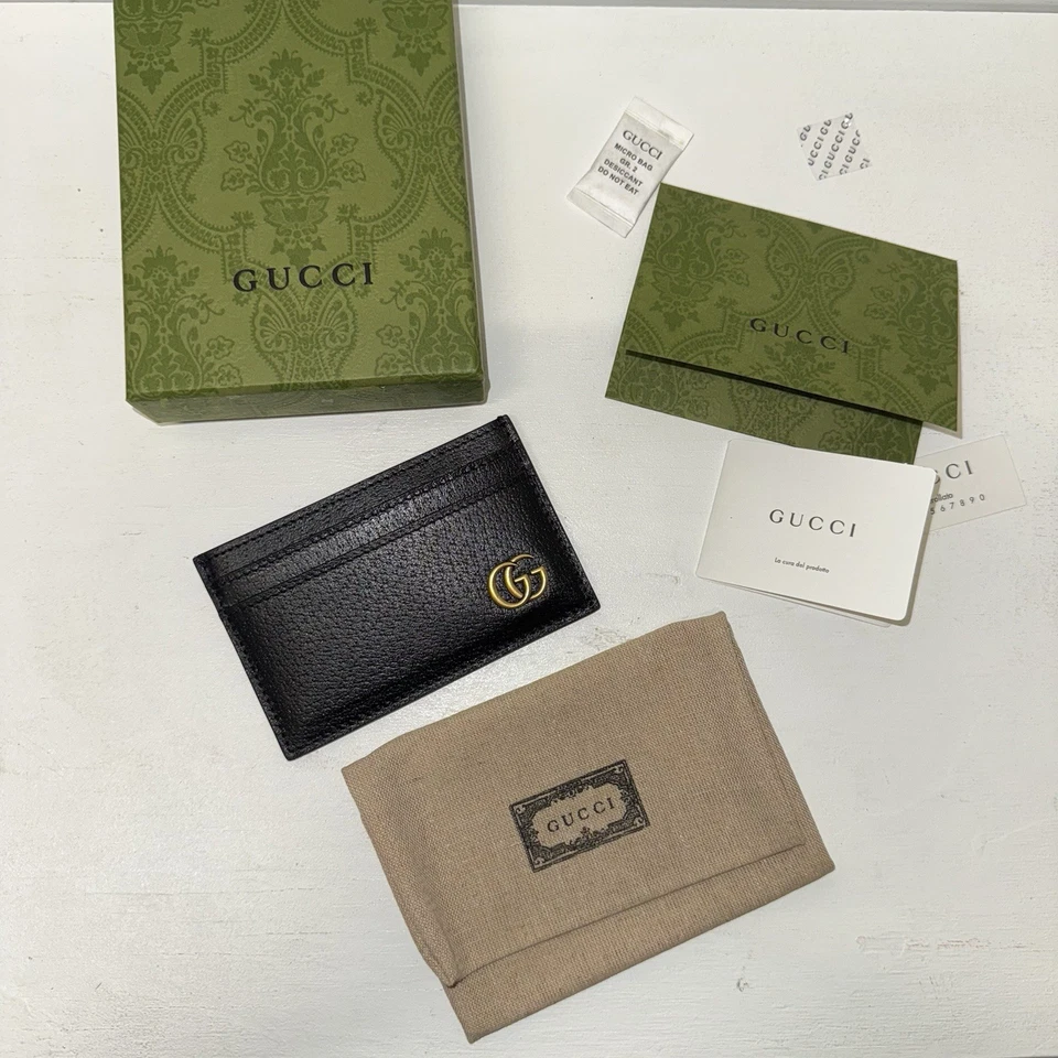 Tarjetero Gucci GG Marmont en dorado/negro Foto 4 de 4