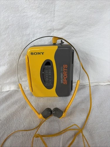 Sony Vintage Walkman Cassette Tape Player AM/FM Radio Sports Head Phones Works