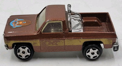 ERTL FALL GUY Colt 1982 GMC Sierra Truck 1/64 Diecast Brown Chrome Wheels Read