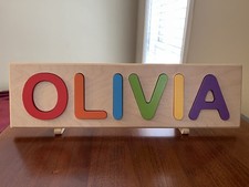 Childs Wooden Name Puzzle " OLIVIA" with Stand.