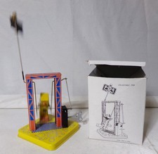 Vintage Tin Wind-up Robot on Swing with Box