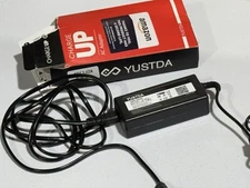 Yustda Power Adapter Output 19V.  Input 100-240 V. 1.5A.